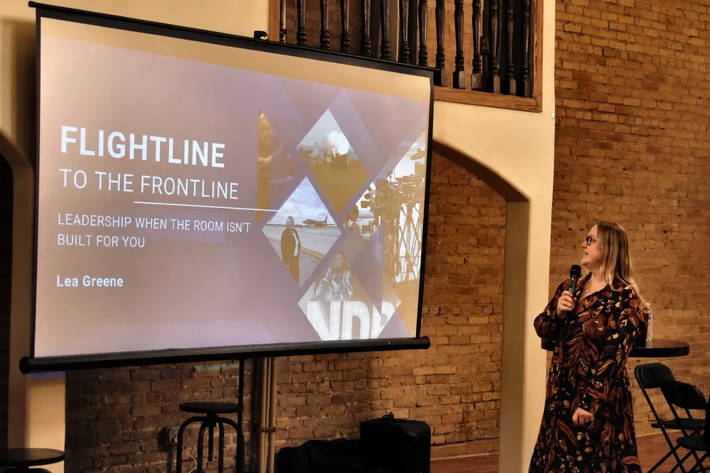 Lea Greene's keynote title slide reading Flightline to the Frontline